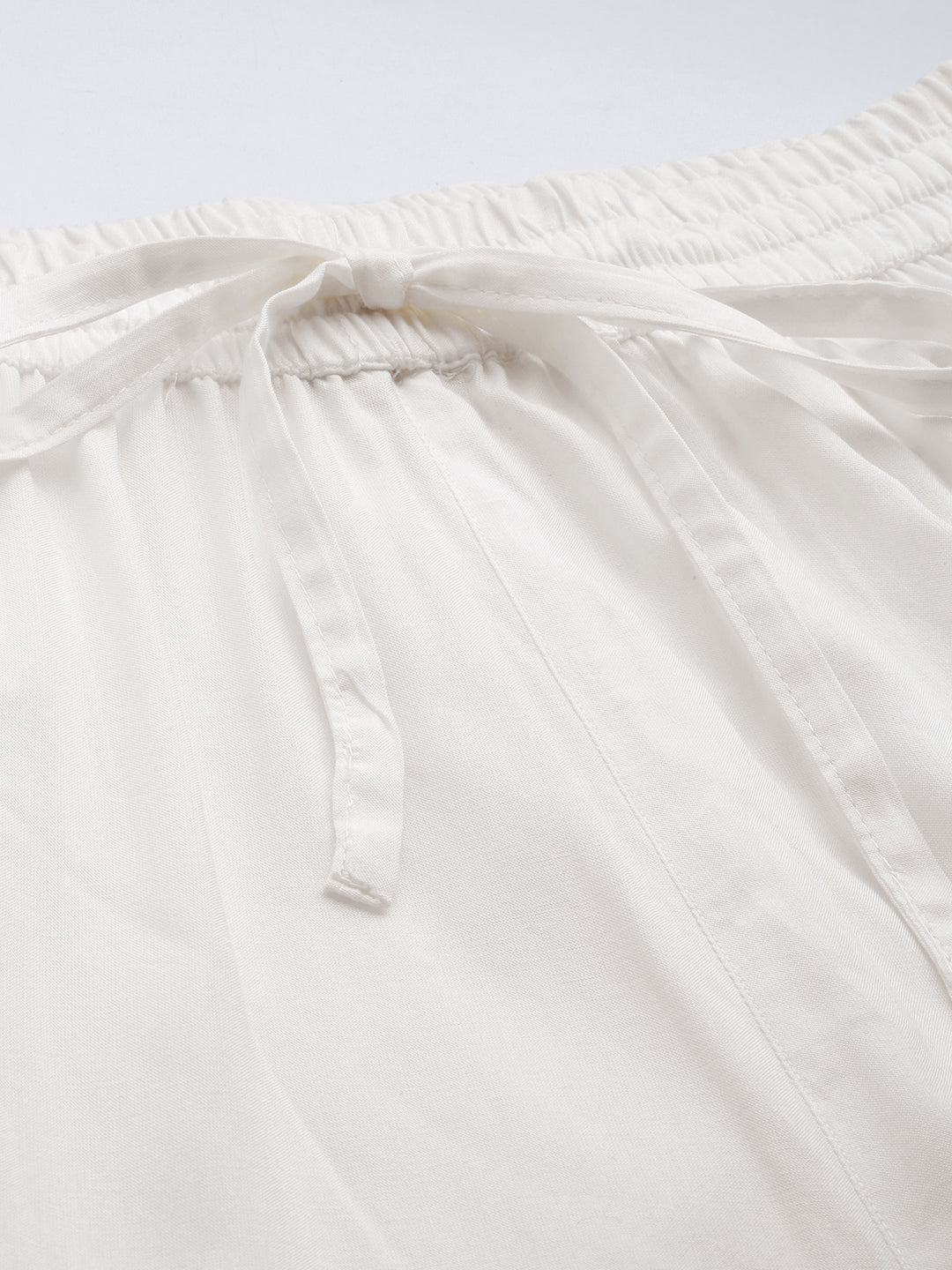 Ivory Pencil Pleated Cigarette Trousers