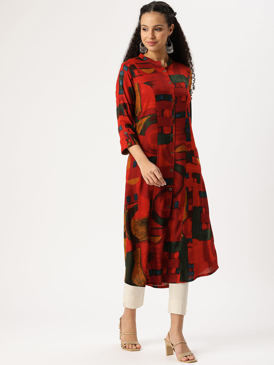Woman wearing a red and black patterned kurta with white pants on a white background, Red Geometric Printed Kurta, Office Wear Kurta, Black Printed kurta, Printed Kurta