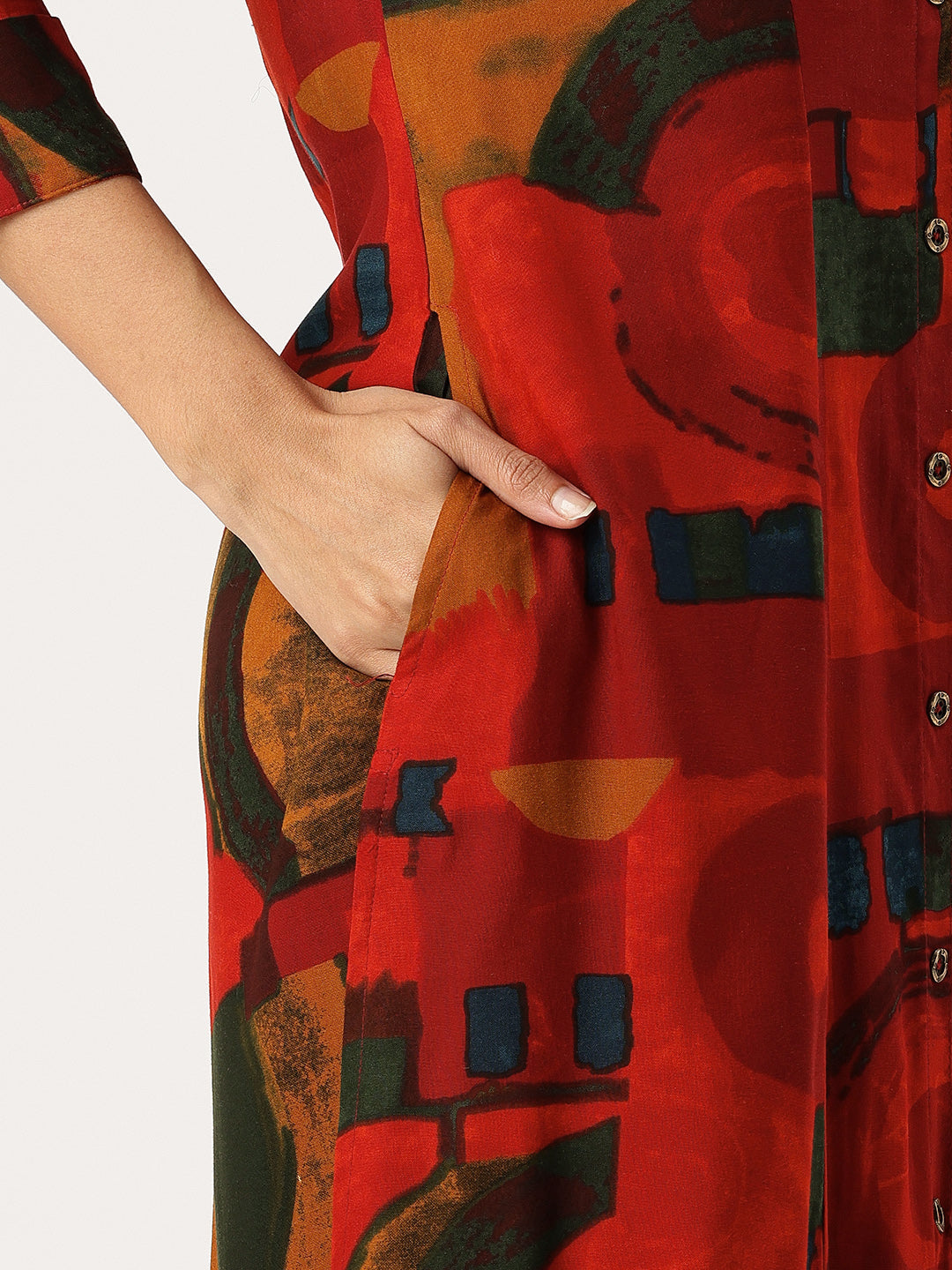 Woman wearing a red and black patterned kurta with white pants on a white background, Red Geometric Printed Kurta, Office Wear Kurta, Black Printed kurta, Printed Kurta